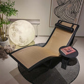 Black vintage chaise lounge chair made of cane wood with elegant design